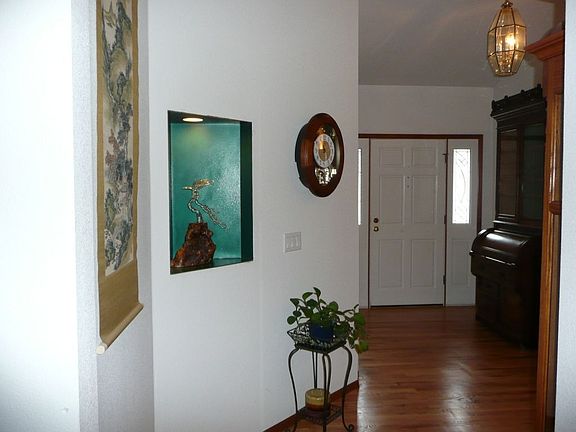 Entry with refinished hardwood floors