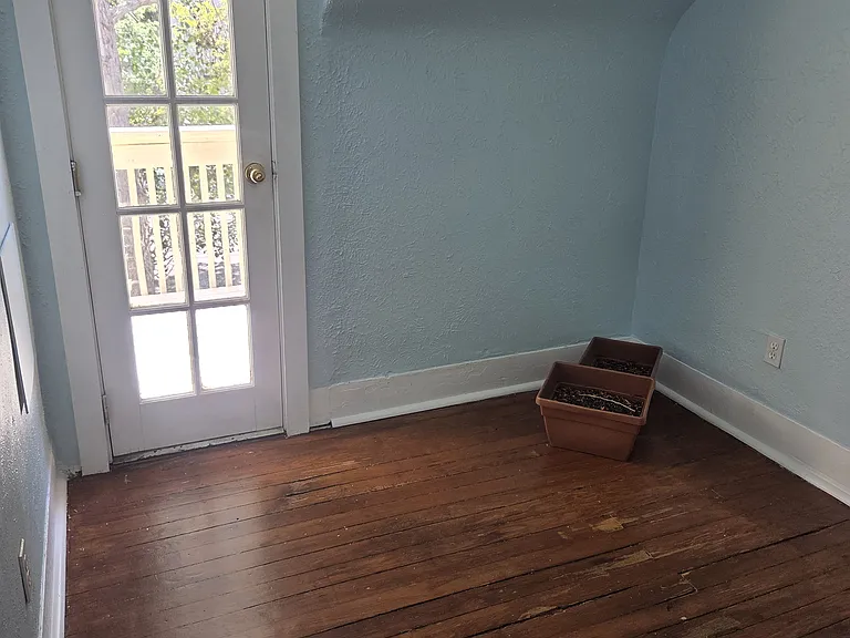 Office from hall, leads to balcony