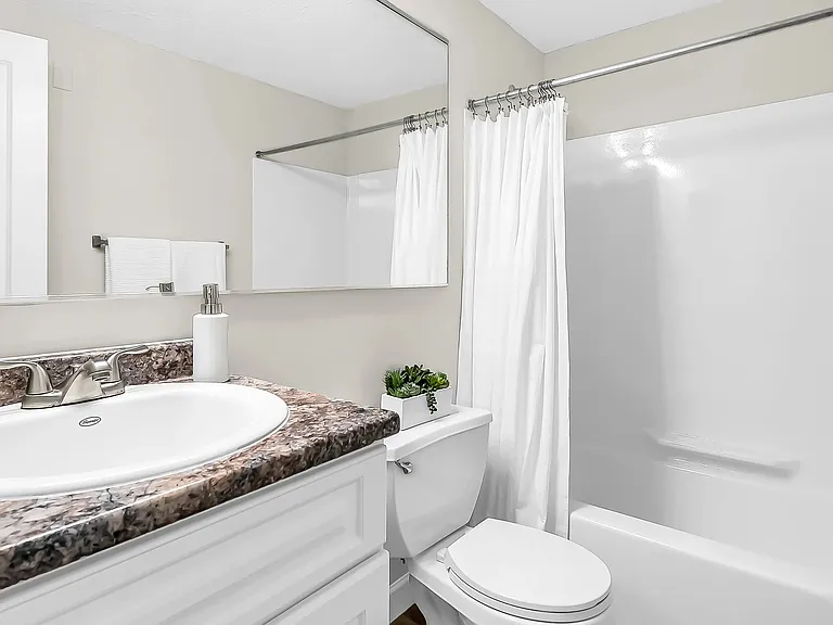 Step into elegance with our stylish upgraded bathrooms, offering a serene space with extended mirrors for your daily pampering.