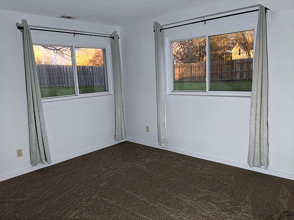 Living room has 2 large windows.