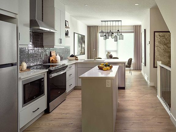 A photo of the kitchen in the Alameda show home in Crown Park by Brookfield Residential