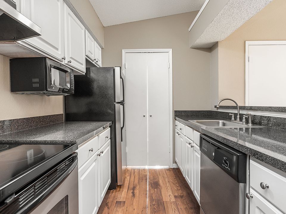 Kitchen with Dishwasher and Microwave - Vue at Knoll Trail