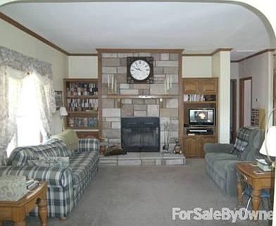 Main living room
						:
						Wood burning fireplace, warms the living room up wonderfully!