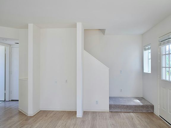 Living Room View to Garage or Upstairs