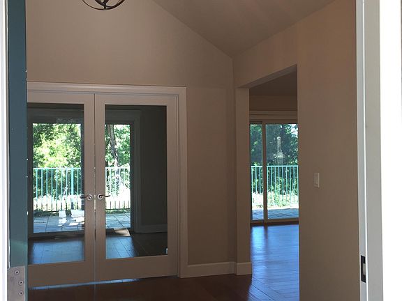 entry with office beyond and family room to the right
