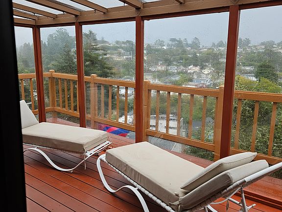Enclosed patio with a view. Freshly refinished decking.