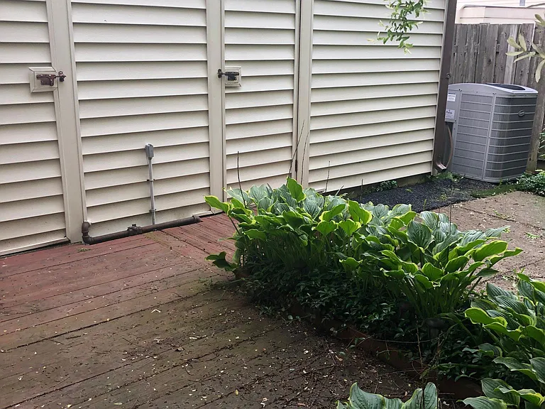 Deck on fenced backyard