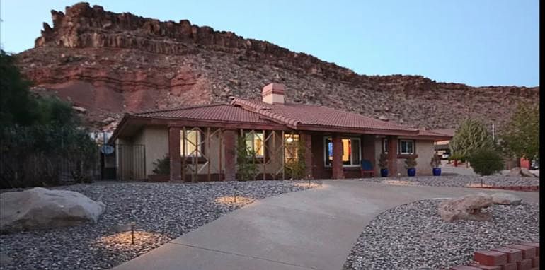Single level. Spanish style rambler. Nestled against the most beautiful backdrop. Nice quiet neighborhood.