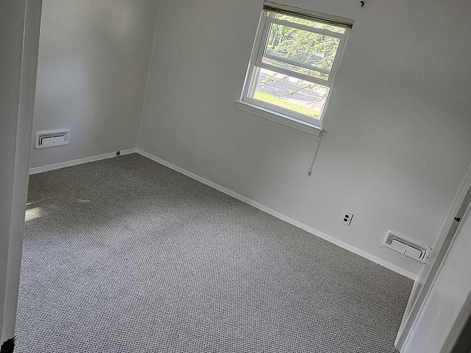 newly painted and carpeted room