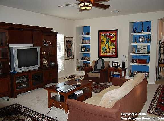 Living Room with sculpted bookshelves