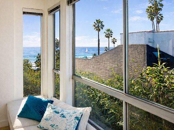 Your peaceful side ocean view from the cozy window seat.