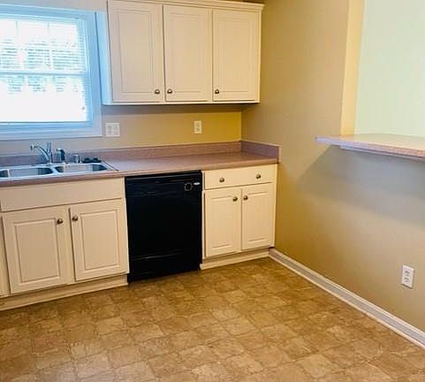 Kitchen with Dish washer, Refrigerator, Microwave and stove