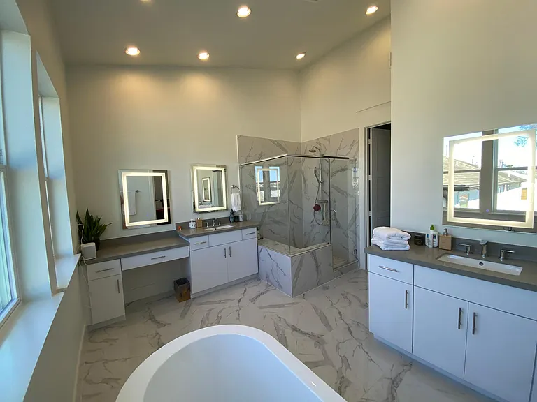 3rd floor master bathroom. All marble and lighted mirrors. Dual shower with bench.
