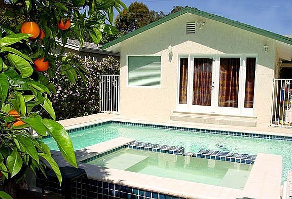 Master Bedroom French Doors to Pool & Oranges