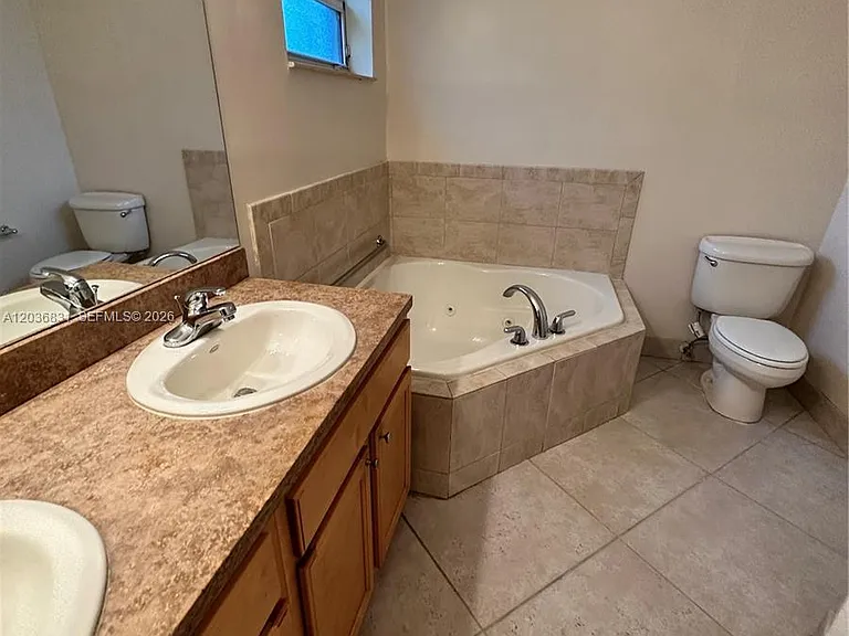 2988 NW 7th Ct — Photo 12