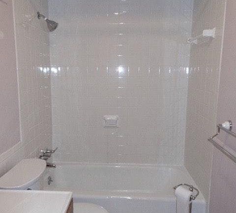 Second floor bath is remodeled with ceramic tub surround and