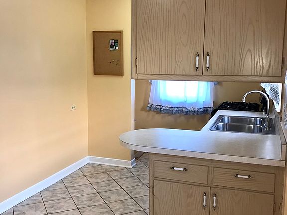 5th image of 5506 N Newland Ave