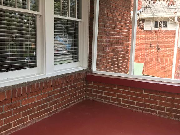 Screened porch at front of house