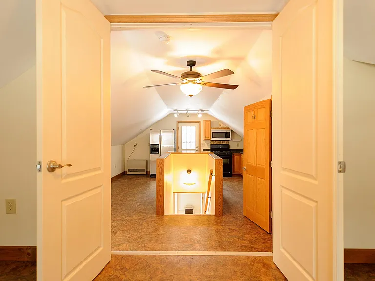 Looking from the bedroom toward the stairs