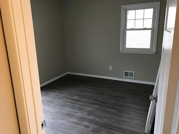 Solid surface flooring throughout main level