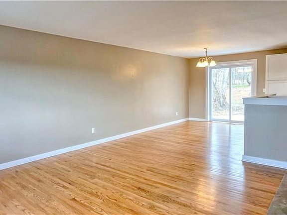 Great open space with gleaming hardwood!