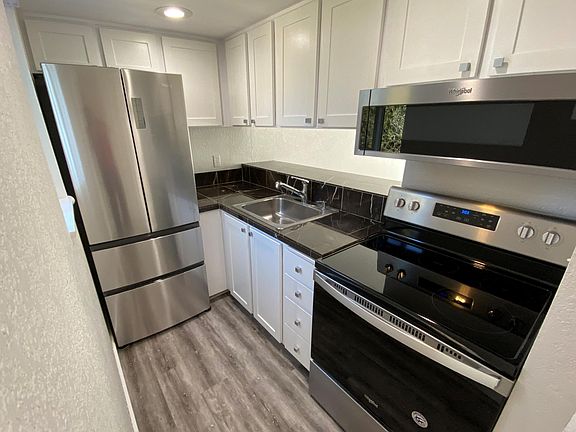 Brand New Fridge, oven/stove and microwave. Marble counter tops.