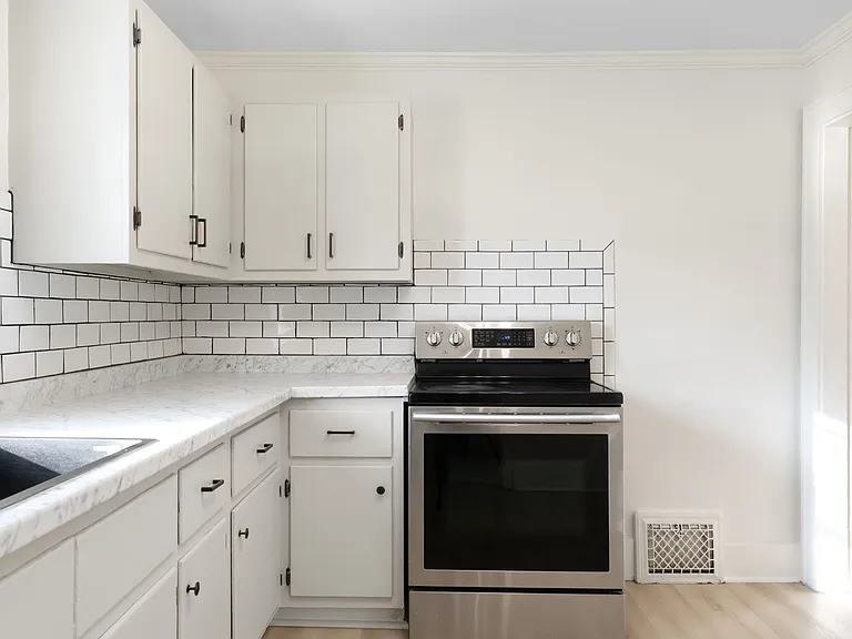 Kitchen with entryway from Dining Room