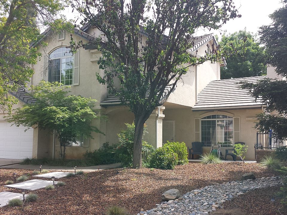 Drought tolerant front yard with lots of shade trees