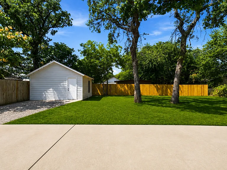 One car sized storage shed for tenant use! Grass digitally enhanced