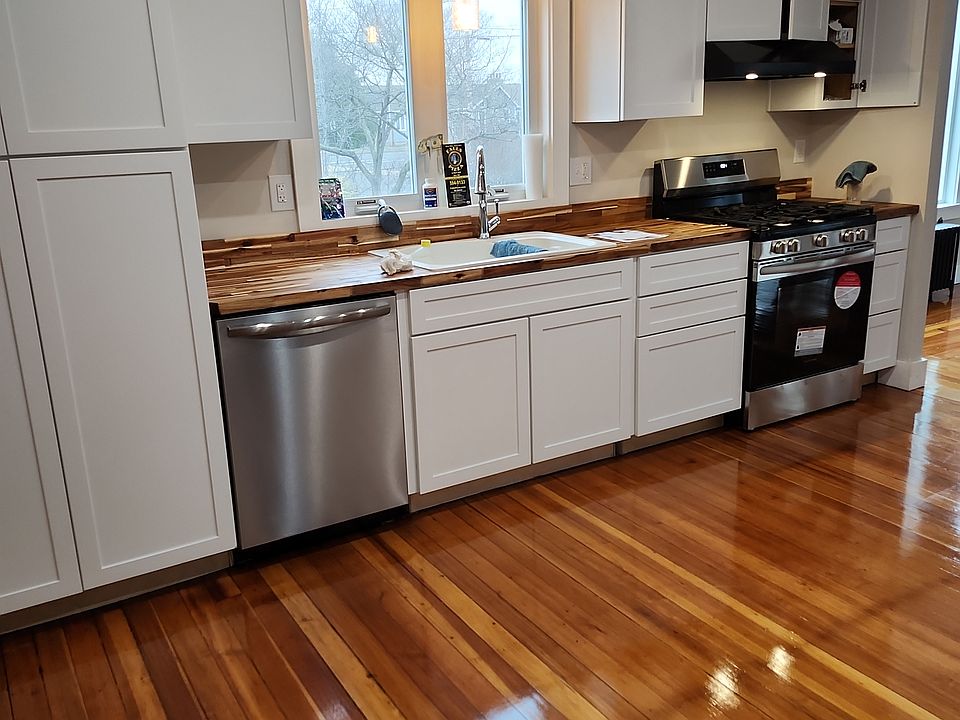 View of kitchen, knobs are now on the brand new cabinets.