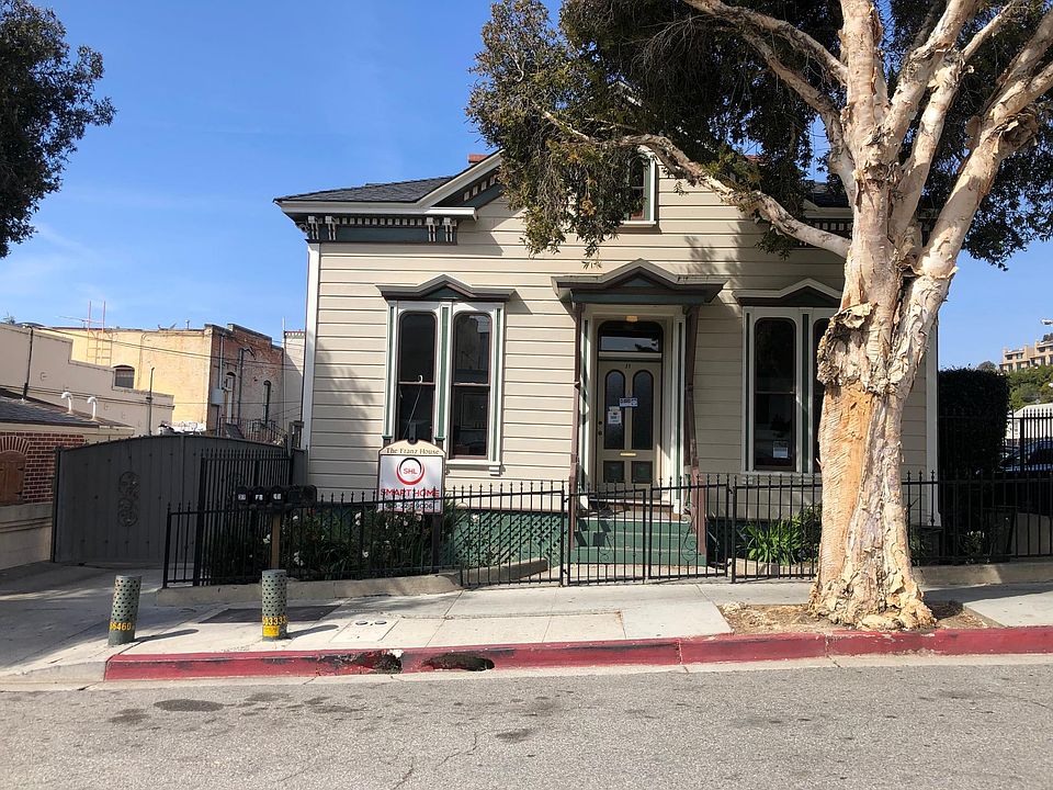 The duplex is behind this historic building. Access to the unit is behind the private gate on the left.