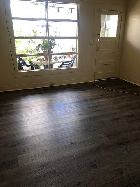 Small, shared patio in front and yard in back.