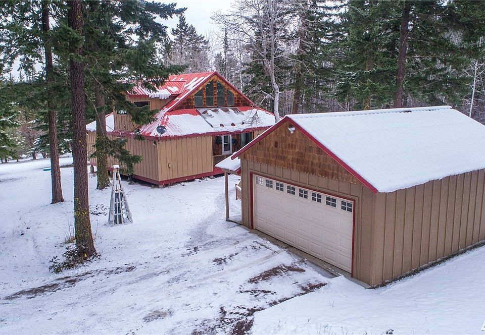 Enjoy the peace and solitude at this custom built home on acreage. Paved parking for easy wintertime access.