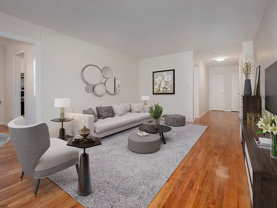 Elevate your lifestyle at 40 Barker Avenue with this spacious, stylish living room featuring modern furnishings and an inviting atmosphere. Enjoy the perfect blend of comfort and sophistication. Don't miss outschedule your tour today!