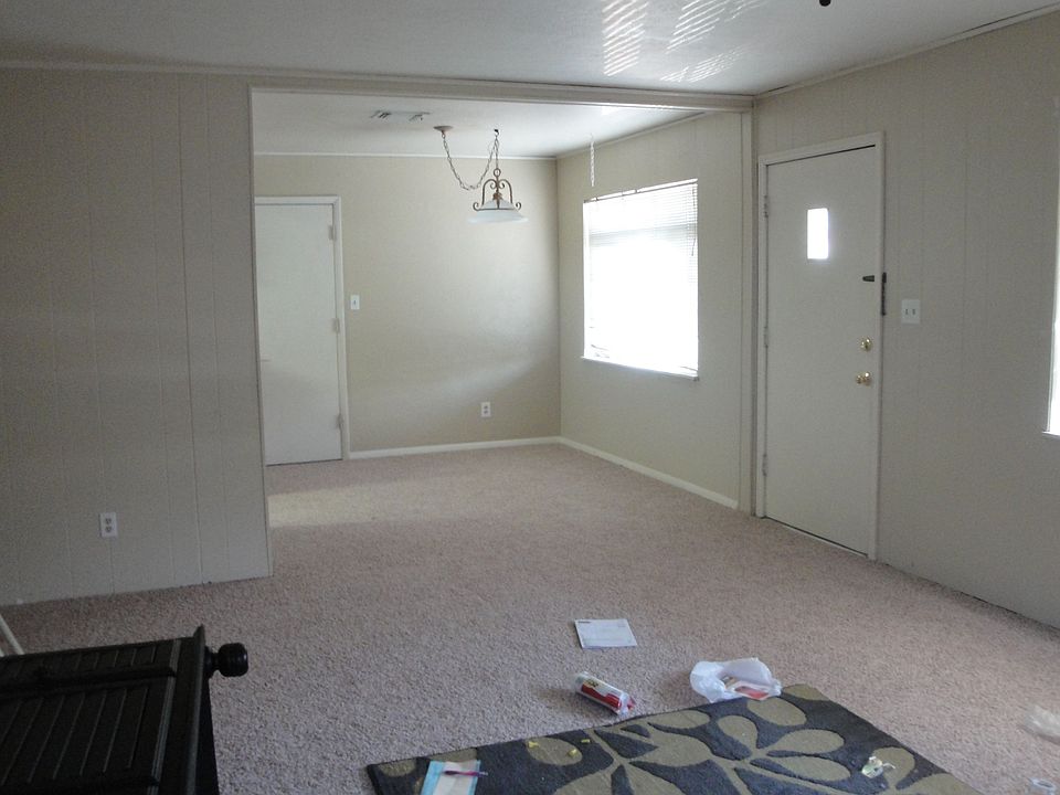 Living Room with Dining Room in Background