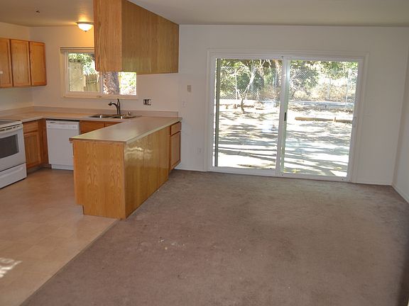 FAMILY ROOM AREA LEADS TO BACK YARD