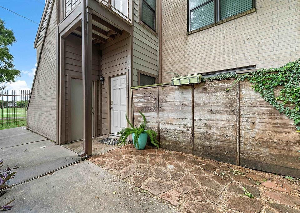 This end unit overlooks Sharpstown Golf Course. It has a private patio.