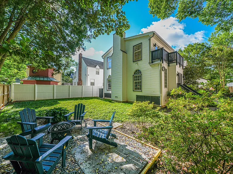 Private rear yard with patio for firepit seating
