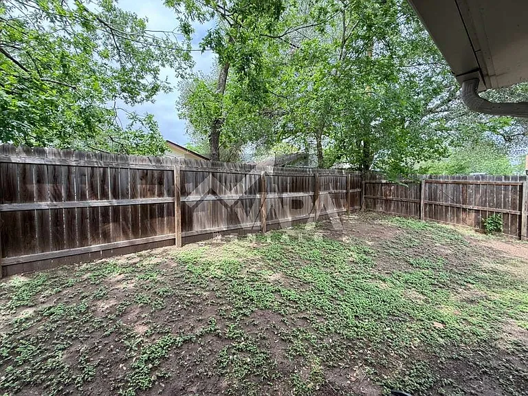 7729 Narrow Pass Dr — Photo 17