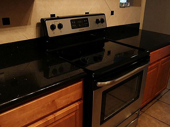 STAINLESS STEEL AND GRANITE COUNTERTOPS
