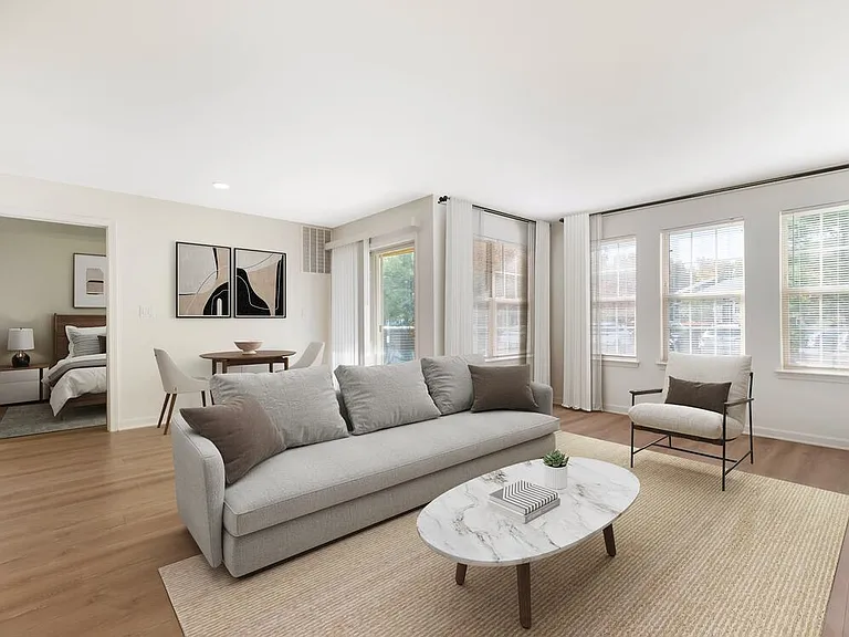 Renovated Package II living and dining room with hard surface flooring