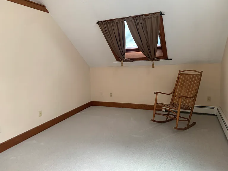 Bedroom from window angle, newly carpeted