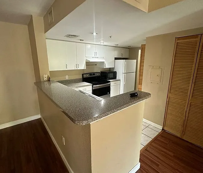 5035 Wiles Rd #203 — Photo 14