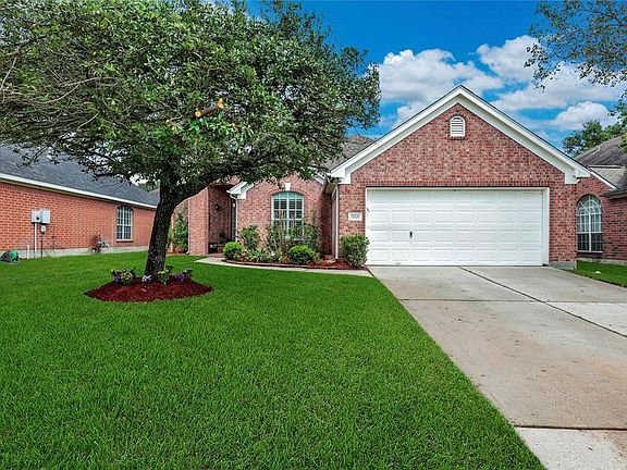 Quality built home by Pulte, this all-brick home is light an