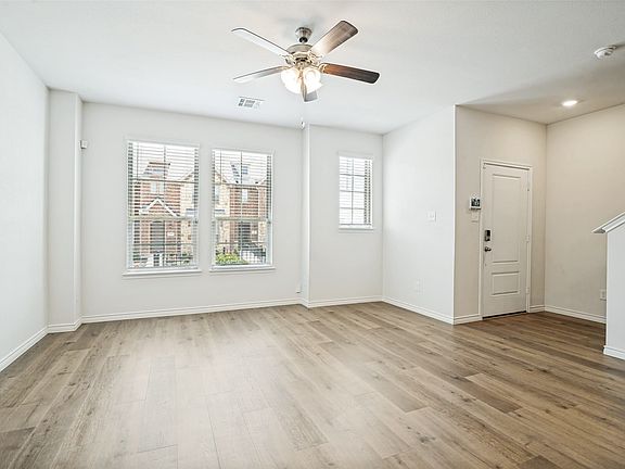 Step into the spacious open concept living ara