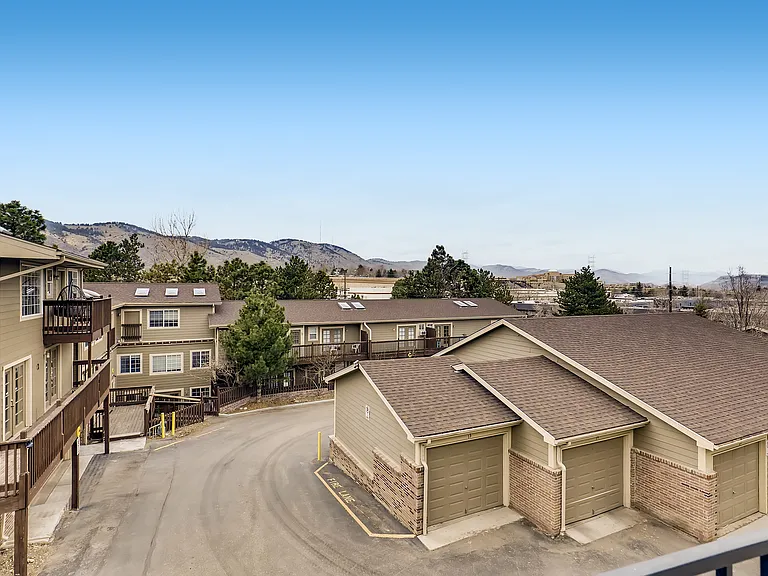 Experience suburban tranquility with mountain views from this welcoming apartment complex.