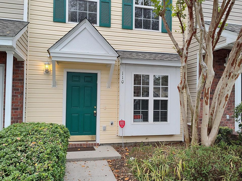 Front of home with new painted door & shutters!