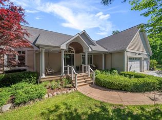 306 W Harbour Ridge Ct, Maple City, MI 49664