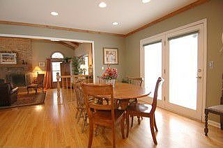 Eating area has slider to huge deck