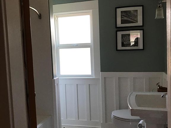 Bathroom - both have subway tile shower
